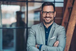 Portrait of a smiling businessman istockphoto 1214385229 612x612 1
